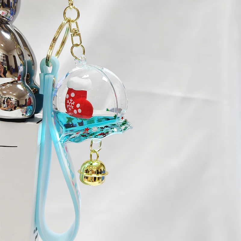 Wind Chime nestemäinen avaimenperä